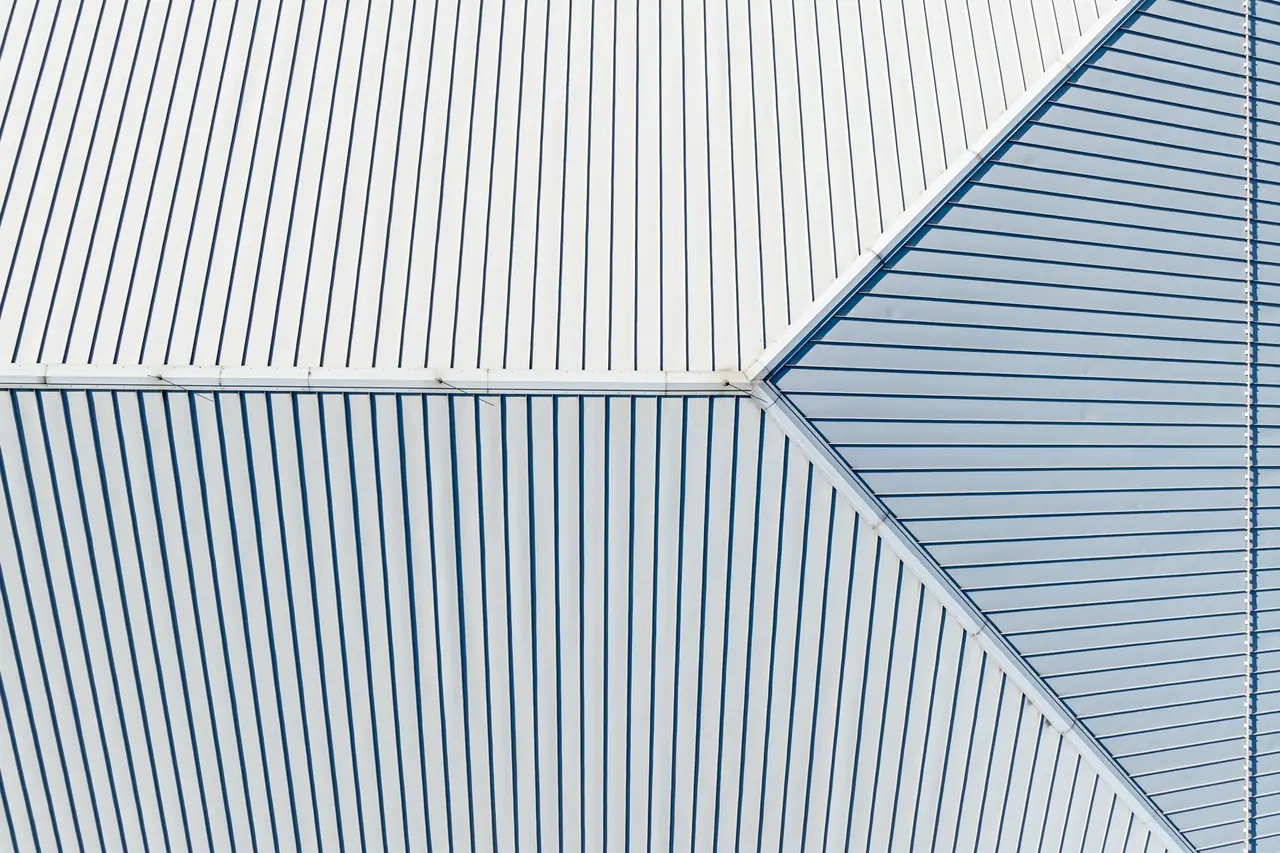 Looking straight down on the ridge of a standing-seam metal roof